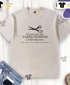 Funny washed t-shirt featuring 'Use my fabric scissors and I'll cut you' graphic, perfect for sewing enthusiasts.