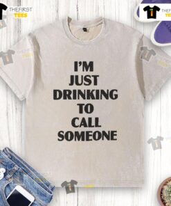 Casual model wearing a 'Pretty I'm Just Drinking to Call Someone' washed T-shirt, showcasing trendy streetwear style.