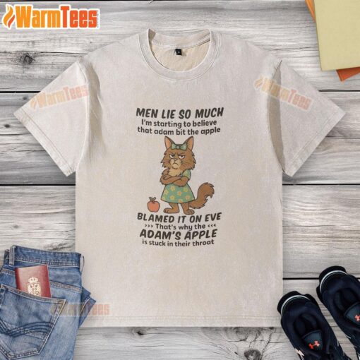 Maine Coon cat lounging in a whimsical 'Im starting to believe' T-shirt, showcasing playful feline charm.