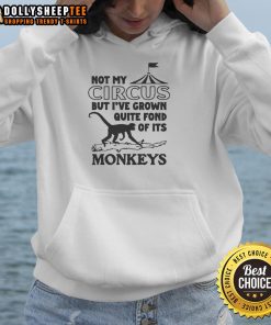 Cozy hoodie featuring the phrase 'Not My Circus But I've Grown Quite Fond of Its Monkeys' with playful monkey graphics.