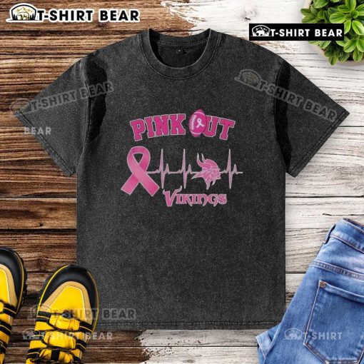 Pretty pink Minnesota Vikings washed t-shirt featuring a breast cancer heartbeat design for awareness and support.