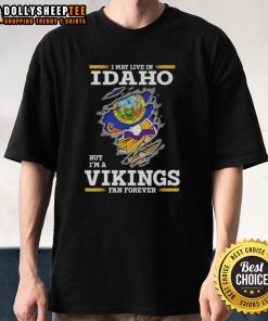 Alt Text: Pretty Premium I May Live In Idaho But I'm A Minnesota Vikings Fan Forever T-Shirt design featuring team colors.