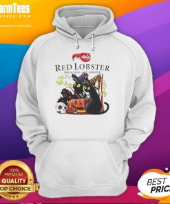 Alt Text: Pretty red lobster, black cat, and pumpkin design on a Halloween hoodie featuring a haunted house theme.