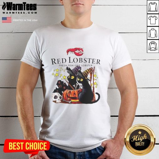 Pretty red lobster wearing a witch hat, surrounded by pumpkins at a haunted house on a Halloween T-shirt.
