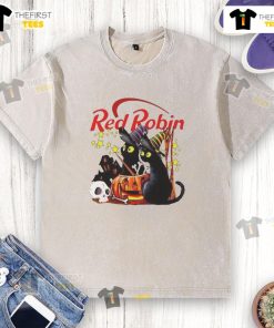 Alt Text: Pretty red robin and black cat with pumpkins near a haunted house on a Halloween washed t-shirt.