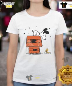 Pretty Snoopy and Woodstock haunted doghouse design on a ladies tee, perfect for Halloween and Peanuts fans.