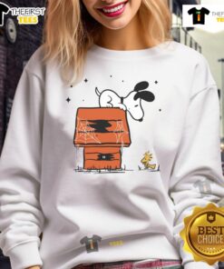 Pretty Snoopy Woodstock Haunted Doghouse Sweatshirt featuring vibrant colors and playful Halloween design for dog lovers.