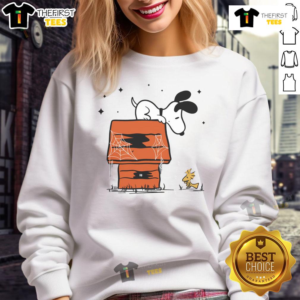 Pretty Snoopy Woodstock Haunted Doghouse Sweatshirt Pretty Snoopy Woodstock Haunted Doghouse Sweatshirt featuring vibrant colors and playful Halloween design for dog lovers.
