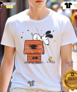 Pretty Snoopy Woodstock Haunted Doghouse T-Shirt featuring a playful design of Snoopy and Woodstock in a spooky setting.