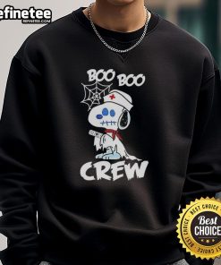 Alt Text: Pretty Snoopy Halloween sweatshirt featuring Peanuts x Boo Boo Crew nurse ghost cartoon design.