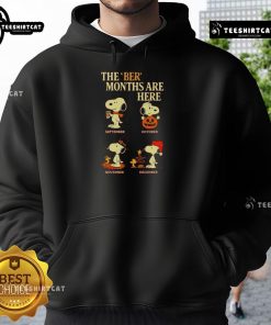 Cozy Snoopy Halloween hoodie featuring vibrant colors, perfect for the Ber months and festive fall celebrations.