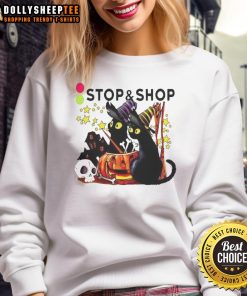 Alt Text: Cozy Halloween sweatshirt featuring a black cat, witch, pumpkin, and haunted house design for festive fall vibes.