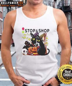 Black cat witch with pumpkin at a haunted house on a Halloween tank top, perfect for festive celebrations.