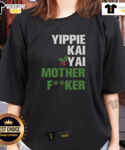 Alt Text: Front and back view of the Pretty Yippie Kai Yay ladies tee, featuring vibrant graphics and a stylish design.