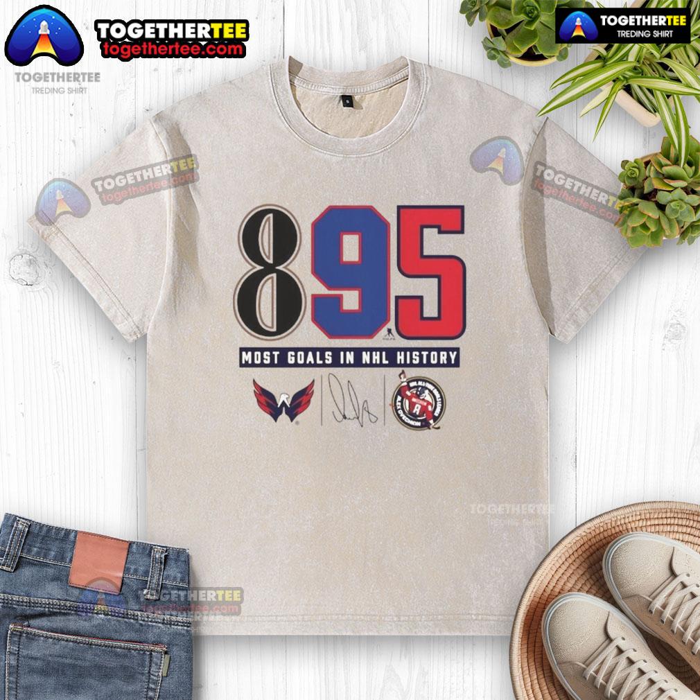 Top Alexander Ovechkin Washington Capitals 895 most Goals In NHL History Signature Washed T-Shirt Top Alexander Ovechkin Washington Capitals 895 Goals NHL History Signature Washed T-Shirt displayed on a hanger.