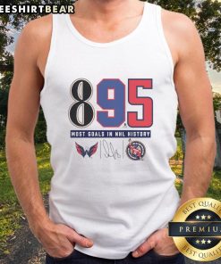 Alt Text: Alexander Ovechkin in a tank top celebrating as Washington Capitals' all-time leading goalscorer with 895 goals.
