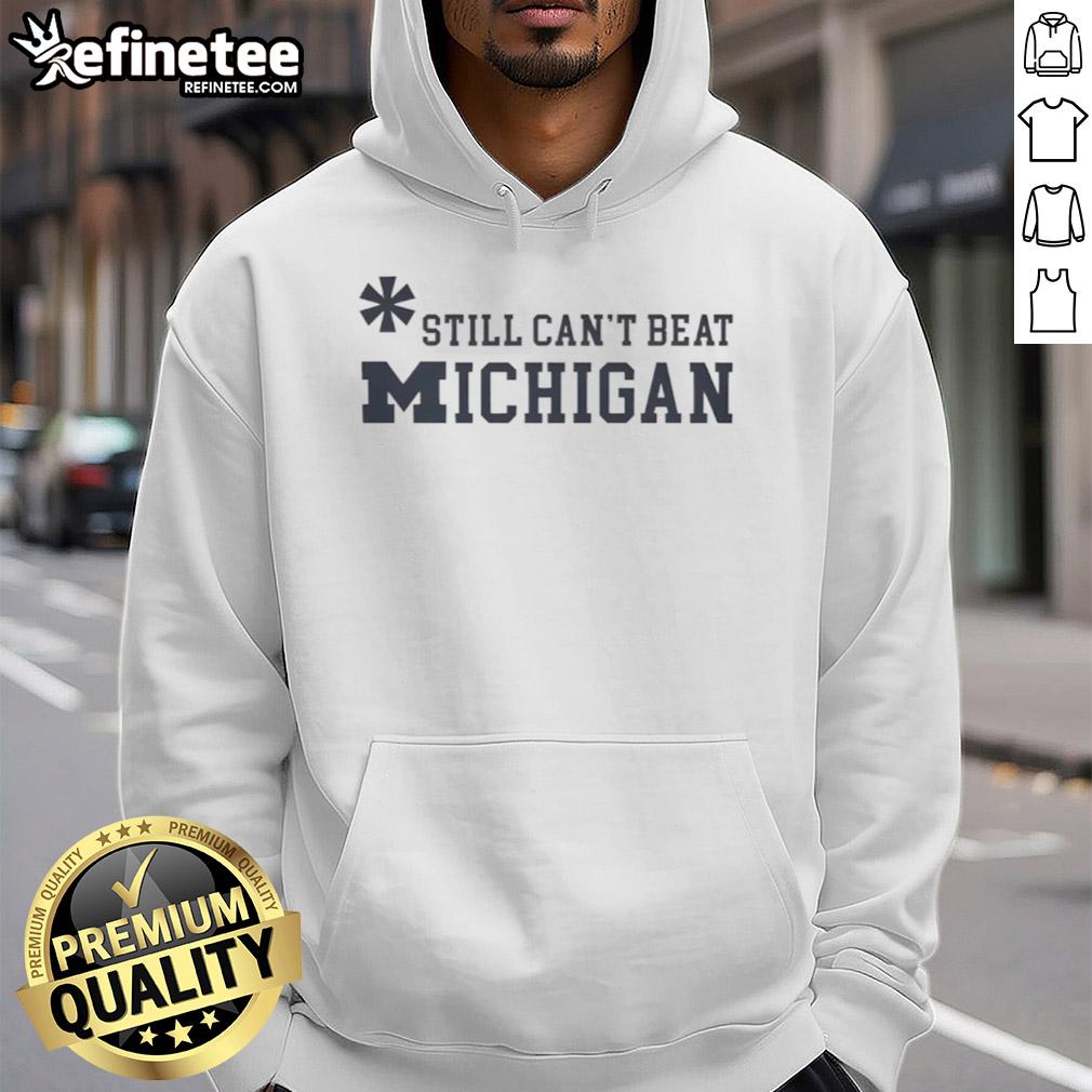 Top Asterisk Still Can'T Beat Michigan Wolverines Hoodie Top Asterisk hoodie featuring Michigan Wolverines logo, perfect for fans showcasing team spirit and pride.