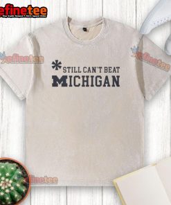 Top Asterisk Still Can't Beat Michigan Wolverines washed t-shirt featuring bold team logo and stylish design.
