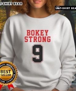 Alt Text: Comfortable Top Bokey Strong 9 Sweatshirt in stylish design, perfect for casual wear and workout sessions.