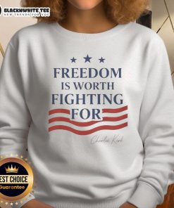 Top Charlie Kirk Freedom Is Worth Fighting For sweatshirt showcasing bold text and a modern design in a stylish setting.
