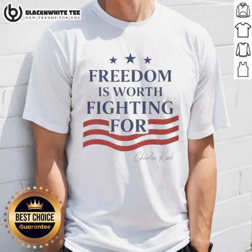 Alt Text: Top Charlie Kirk Freedom Is Worth Fighting For T-Shirt design featuring bold lettering on a black background.