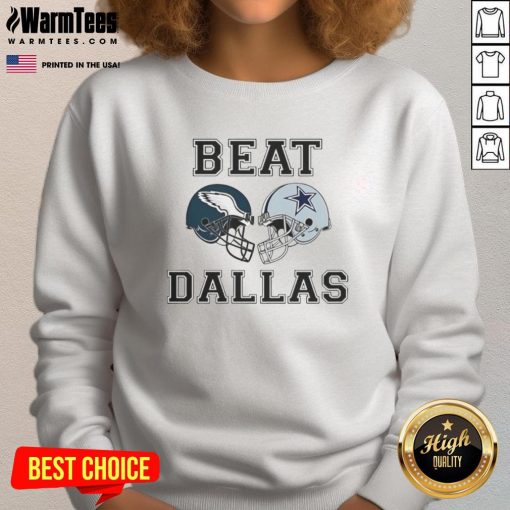 Top Coach Nick Sirianni wearing a Dallas Beat sweatshirt, showcasing team spirit and style during a football event.