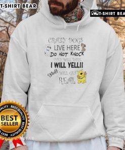 Funny hoodie with 'Top Crazy Dogs Live Here' text, warning of barking dogs and yelling, perfect for dog lovers.