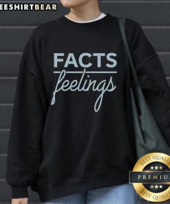 Cozy Top Facts Feelings sweatshirt displayed on a hanger, perfect for casual wear and expressing your unique style.