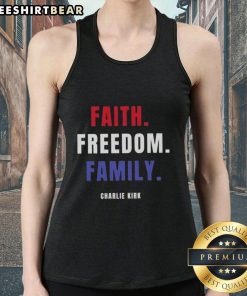 Charlie Kirk wearing a 'Top Faith Freedom Family' tank top, promoting conservative values and family unity.