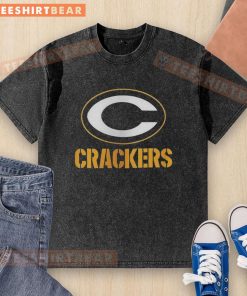 Top Green Bay Packers crackers washed t-shirt displayed on a hanger with vibrant team colors and logo, ideal for fans.