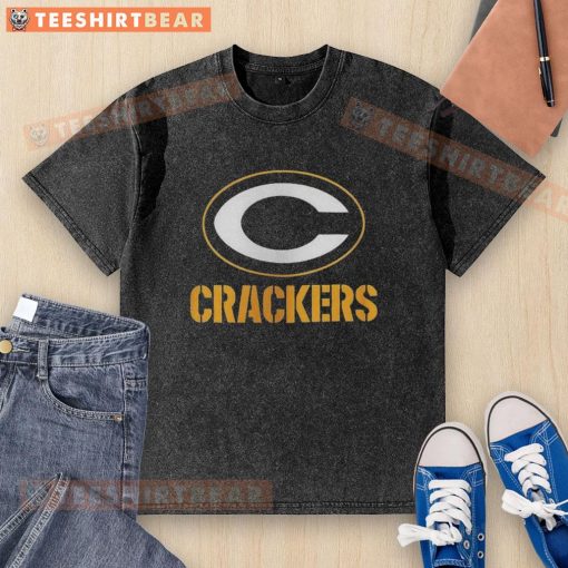 Top Green Bay Packers crackers washed t-shirt displayed on a hanger with vibrant team colors and logo, ideal for fans.