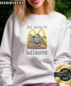 Cozy Top Grinch Halloween sweatshirt featuring festive design, perfect for McDonald's Halloween celebrations.
