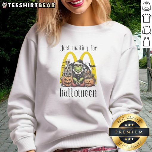 Cozy Top Grinch Halloween sweatshirt featuring festive design, perfect for McDonald's Halloween celebrations.