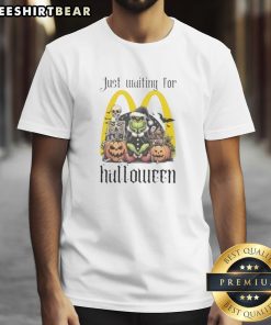 Alt Text: Top Grinch character featuring a McDonald's Halloween T-shirt, perfect for festive celebrations and costume parties.