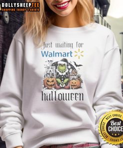Top Grinch Halloween sweatshirt waiting for Walmart shoppers, featuring festive design perfect for Halloween celebrations.