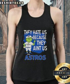 Top Houston Astros Grinch Christmas tank top featuring 'They Hate Us Ain't Us' design for festive sports fans.