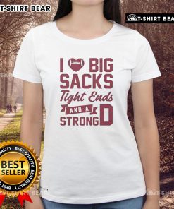 Alt Text: Top I Love Big Sacks Tight Ends And A Strong D Ladies Tee featuring a bold graphic design for football fans.