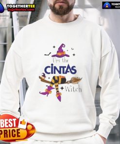 Top Im The Cintas Witch Halloween Sweatshirt featuring a spooky design, perfect for festive celebrations and cozy wear.