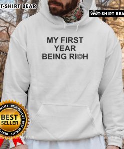 Alt Text: Jalen Carter Eagles hoodie highlighting my first year being rich, featuring vibrant team colors and stylish design.
