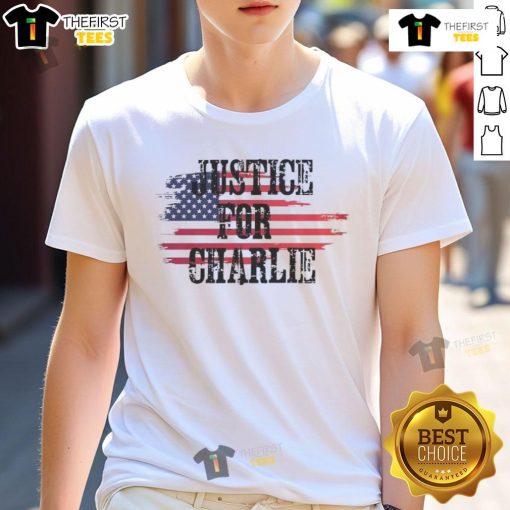 Alt Text: Top Justice For Charlie Kirk USA Flag Rest In Peace T-Shirt featuring patriotic design and tribute graphic.