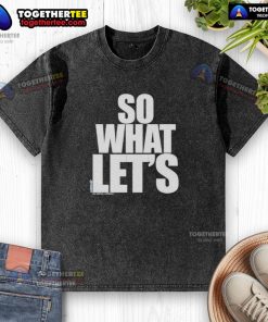 Top Korn Star So What Lets washed T-shirt displayed on a hanger, showcasing its unique design and vintage style.