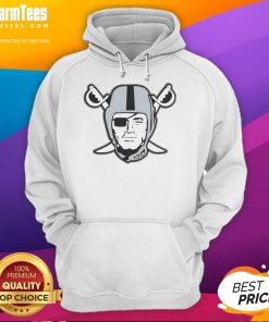 Alt Text: Top Mark Davis wearing a Las Vegas Raider logo hoodie, showcasing team spirit and style at a game event.