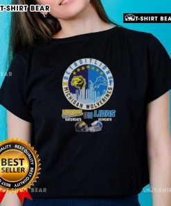 Michigan Wolverines and Detroit Lions helmets with city skyline on a ladies tee, perfect for game day style.