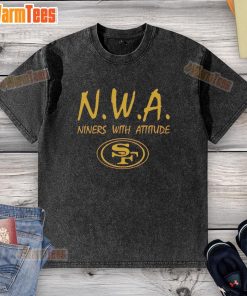 Top NWA Nines With Attitude San Francisco 49ers logo washed t-shirt displayed on a wooden background.