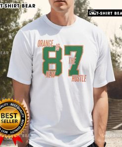 Top Orange Is The New Hustle 87 T-Shirt design featuring bold lettering on a vibrant orange background.