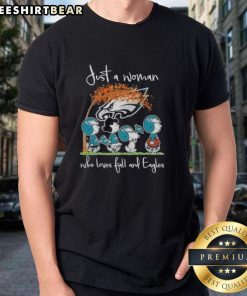Top Peanuts Just A Woman Who Loves Fall and Philadelphia Eagles Football T-Shirt, perfect for autumn sports fans.