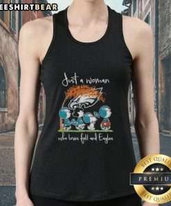 Just a woman who loves fall and Philadelphia Eagles football wearing a stylish tank top featuring peanuts design.