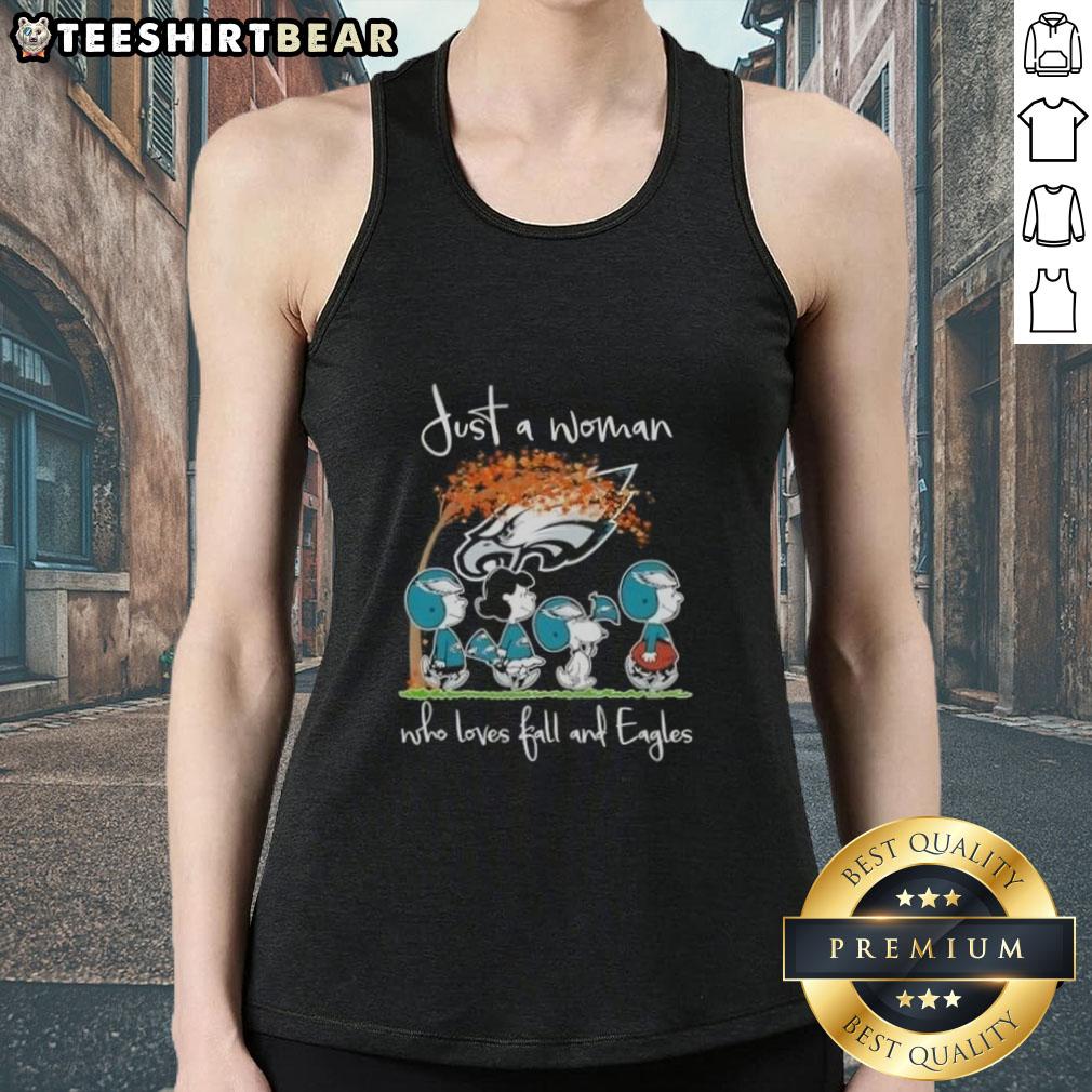 Top Peanuts Just A Woman Who Loves Fall And Philadelphia Eagles Football Tank Top Just a woman who loves fall and Philadelphia Eagles football wearing a stylish tank top featuring peanuts design.