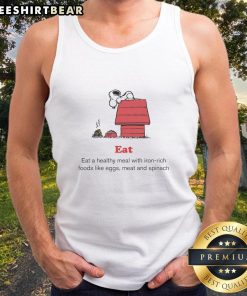 Person wearing a tank top featuring Top Peanuts and American Red Cross, promoting iron-rich meals like eggs and spinach.