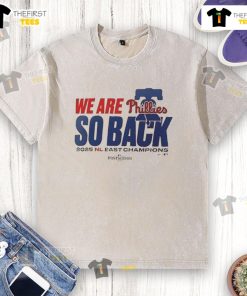 Alt Text: Top Philadelphia Phillies 'We Are So Back' 2025 NL East Division Champions washed t-shirt displayed on a neutral background.